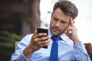 Portrait of businessman talking on mobile phone